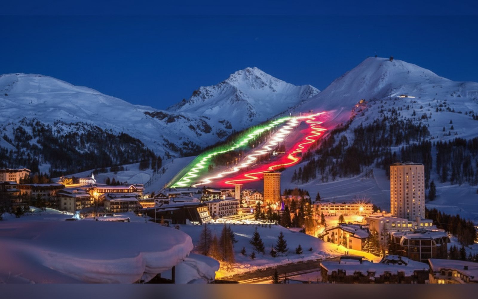 Nido di Cloe, Sestriere di sera con la pista illuminata